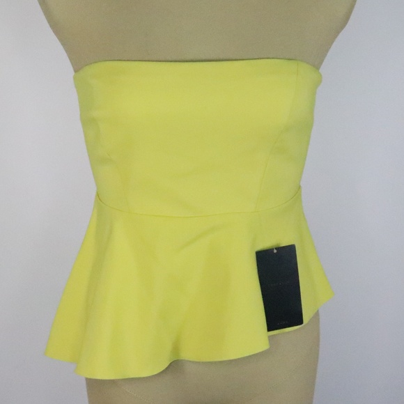 yellow asymmetrical top